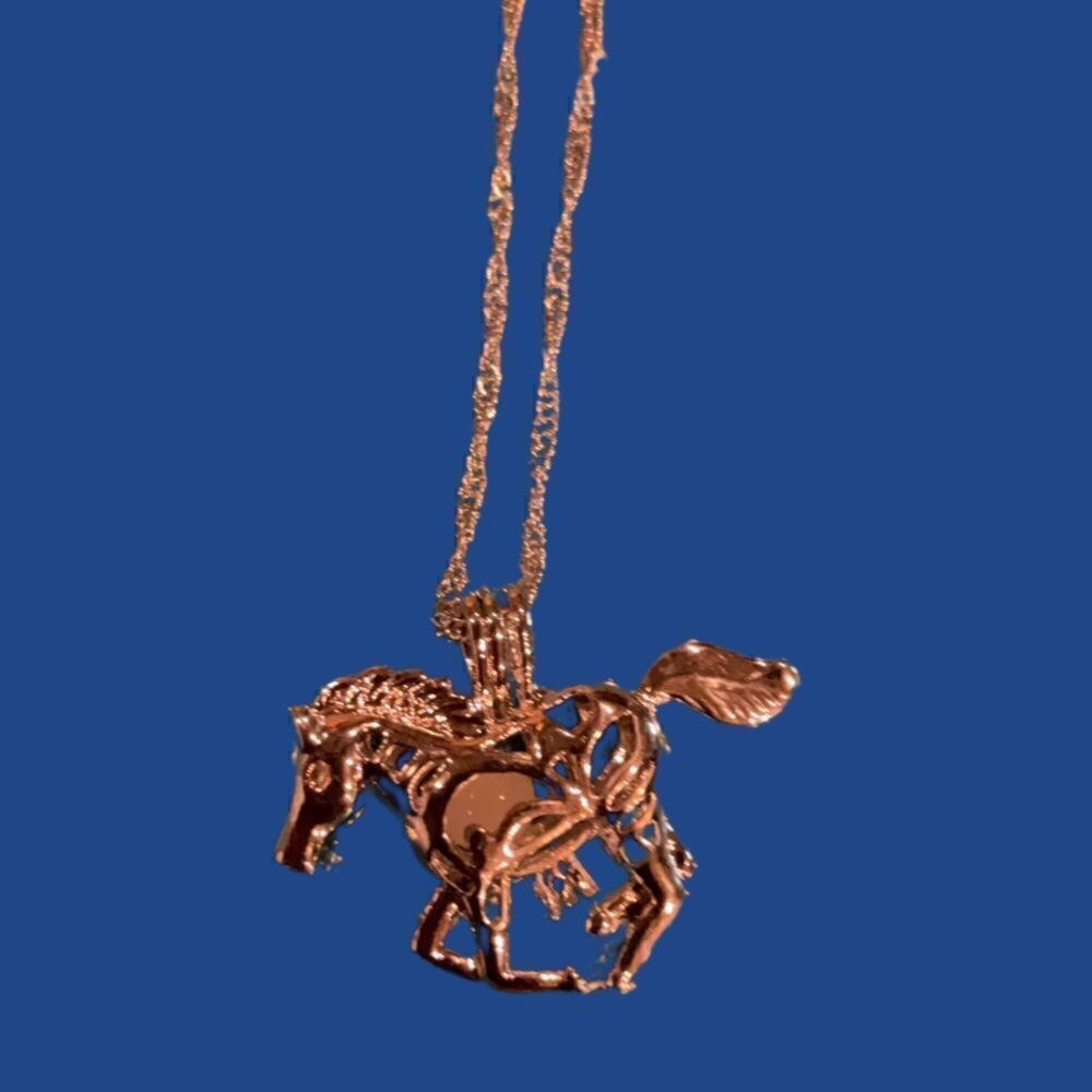 Glow in the dark horse necklace NWT